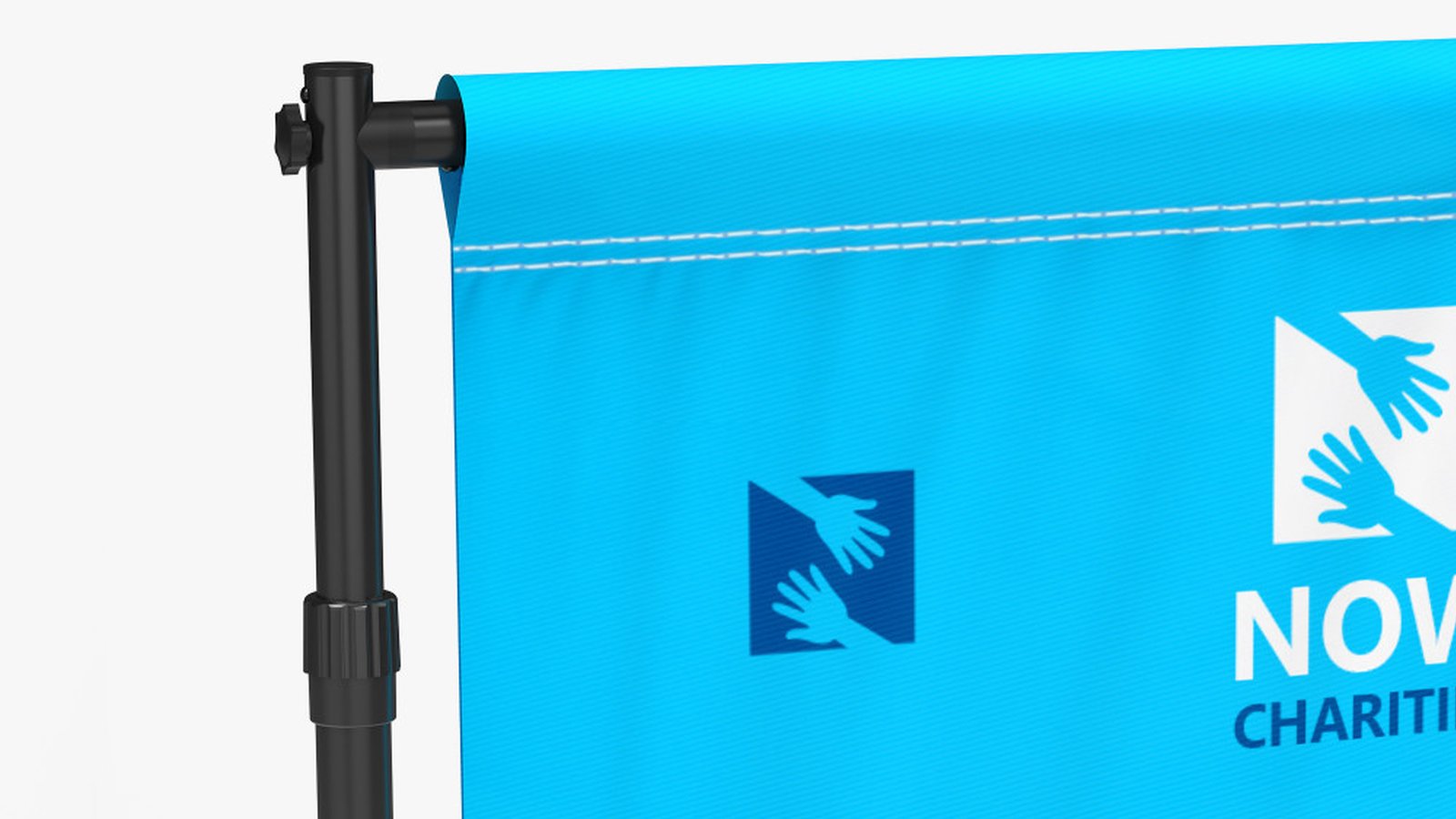 Close-up of the fabric graphic hanging from its pole pocket on the frame